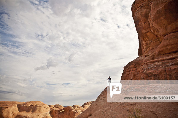 A hiker in Arches National Park  Utah