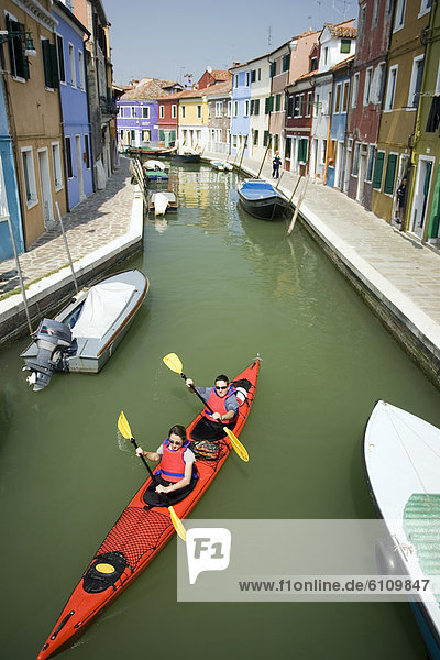 A couple sea kayak in Venice  Italy.