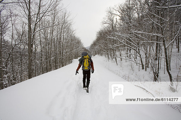 Man mountaineering  New Hampshire.