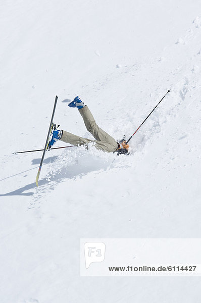 Lone skier making turns in alpine environment  Washington.