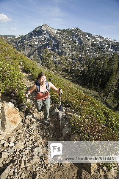 Young woman hiking near Donner Pass  CA.