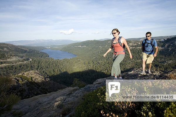 Young woman and man hiking near Donner Pass  CA.