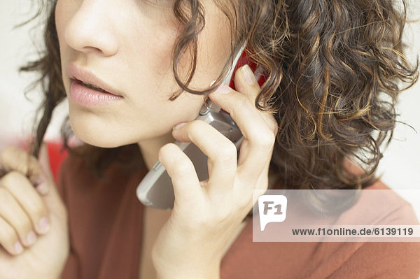 Close up of woman talking on mobile phone