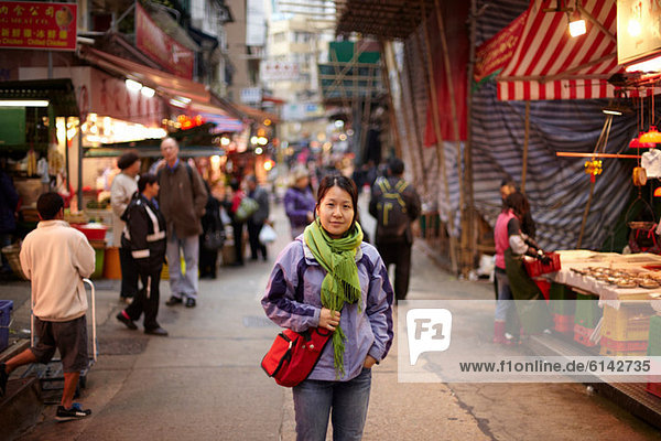 Portrait of woman in market  hong kong  china
