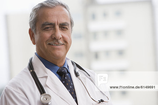 Smiling Hispanic doctor