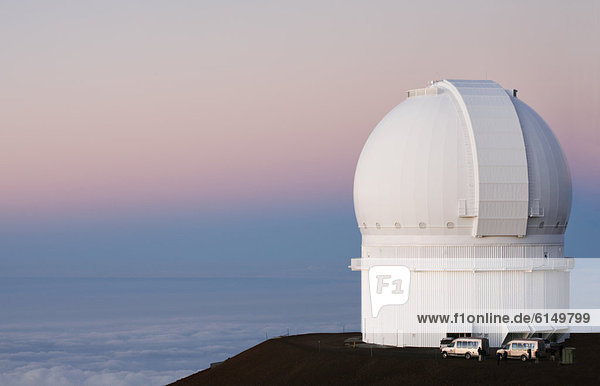 Observatory on hilltop over ocean