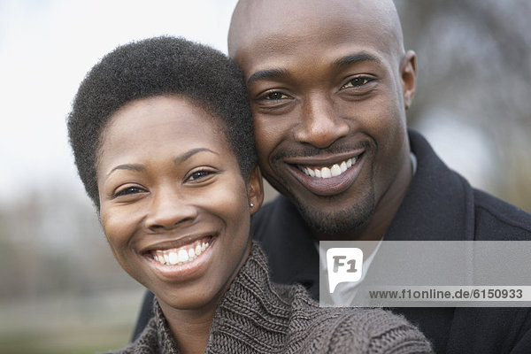 Close up of African couple smiling