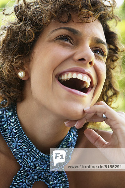 Close up of South American woman laughing