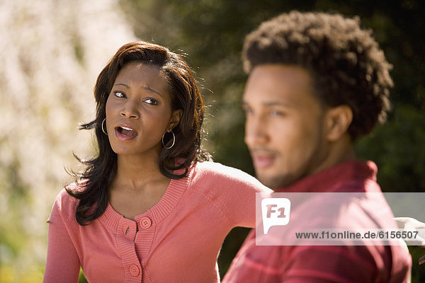 African American woman yelling at boyfriend
