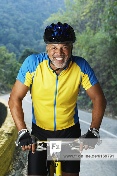 African male cyclist riding bicycle