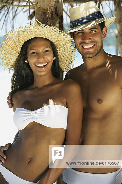 Hispanic couple in bathing suits