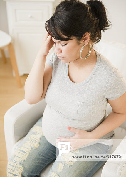 Pregnant Hispanic woman with headache