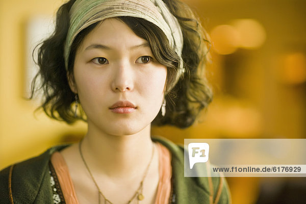 Asian woman wearing headband