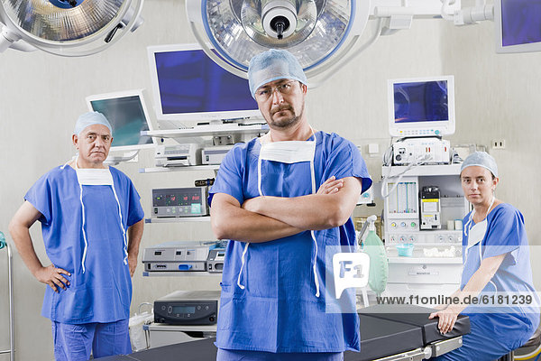 Surgeons in hospital operating room