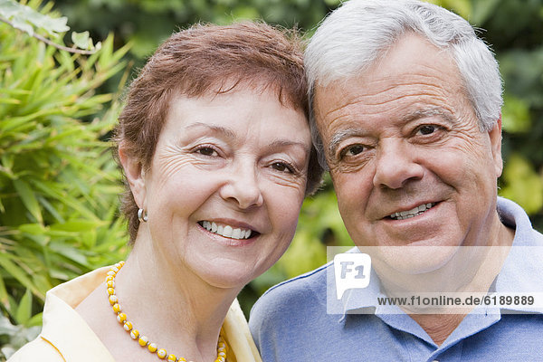 Smiling senior Chilean couple