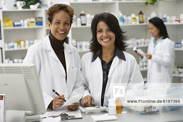 Portrait of female pharmacists in pharmacy