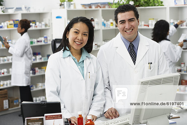 Portrait of pharmacists in pharmacy