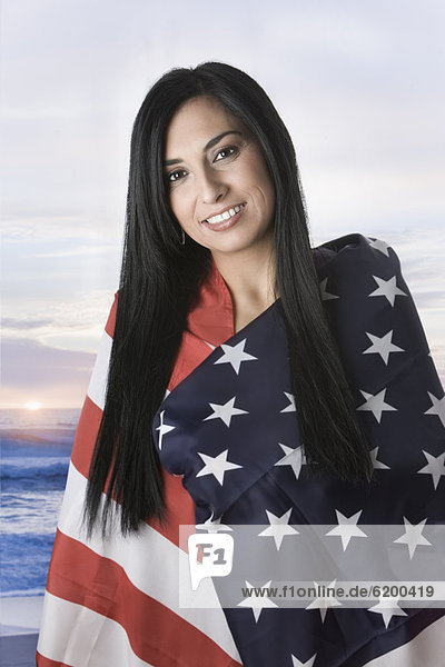 Turkish woman wrapped in American flag
