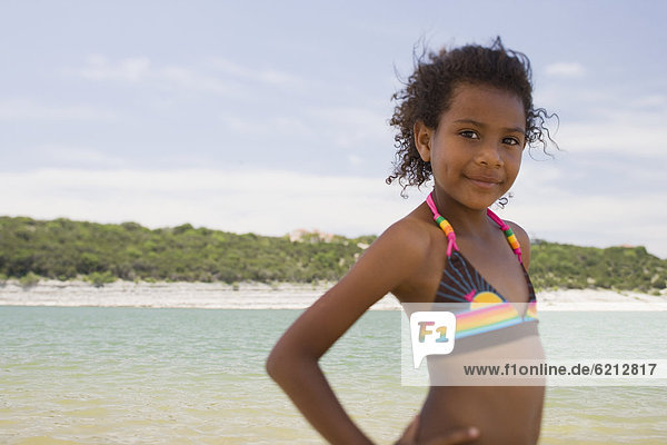 African girl wearing bikini on beach