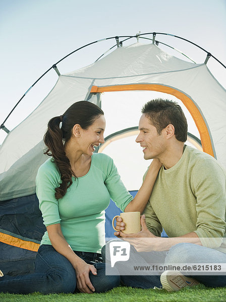 Hispanic couple camping