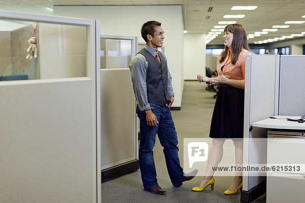 Business people talking together in office