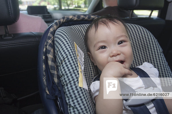 Chinese baby in car seat