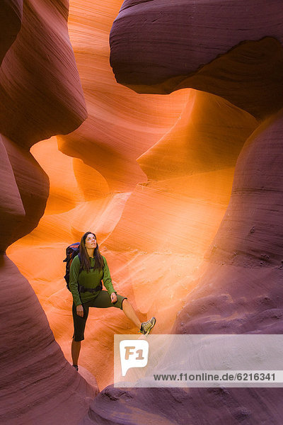 Persian woman hiking in canyon