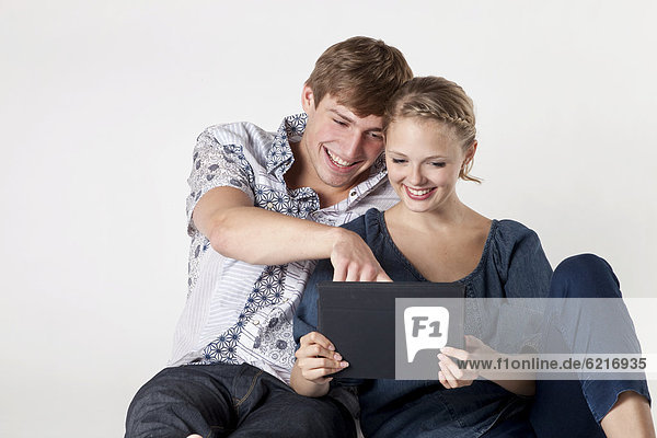 Young couple with iPad