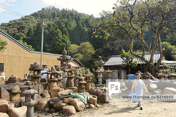 Many stone lanterns at a stone mason's yard  typical of Kurama  near Kyoto  Japan  East Asia  Asia