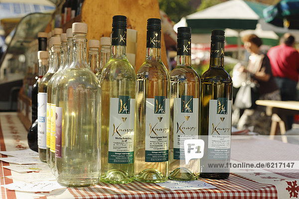 White wine bottles  farmers' market at Kaiser-Josef-Platz square  Graz  Styria  Austria  Europe
