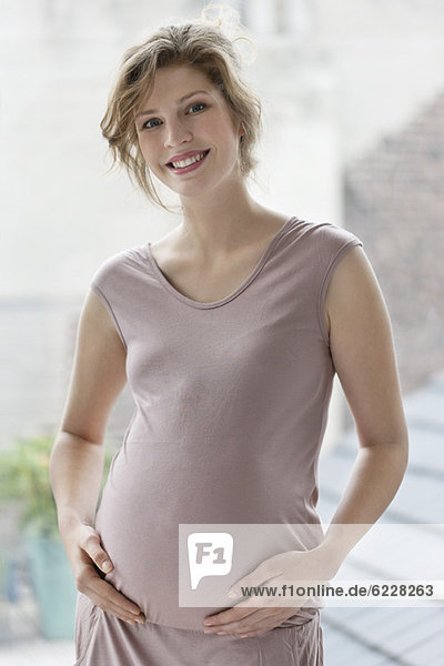 Pregnant woman smiling