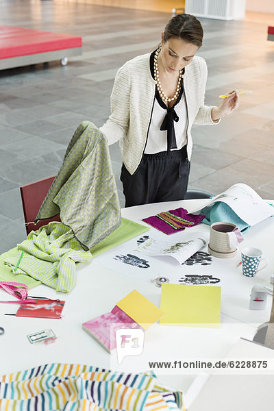 Female fashion designer working in an office