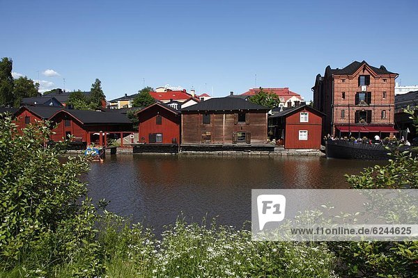 Old red hut granary warehouses on banks of River Porvoonjoki  Porvoo  Uusimaa  Finland  Scandinavia  Europe