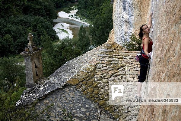 A climber on the cliffs known as the Tennessee Walls  high above the Tarn river and home to some of the most spectacular pitches of rock climbing in Europe  Gorges du Tarn  near Millau and Rodez  Cevennes region  south west France  Europe
