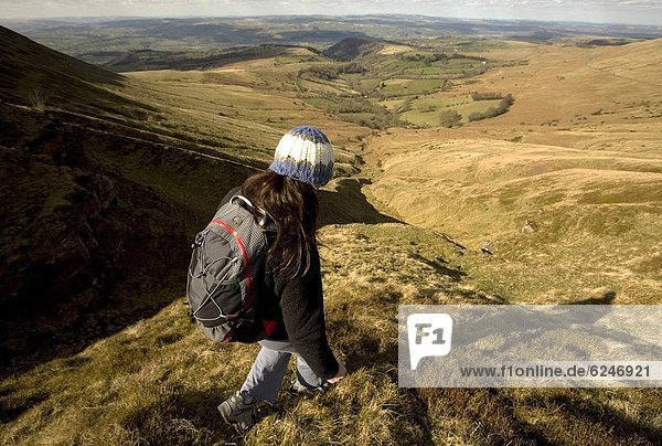 A hiker enjoys solitude in the hills above Hay-on-Wye  on the eastern edge of the Brecon Beacons National Park  Monmouthshire  Wales  United Kingdom  Europe