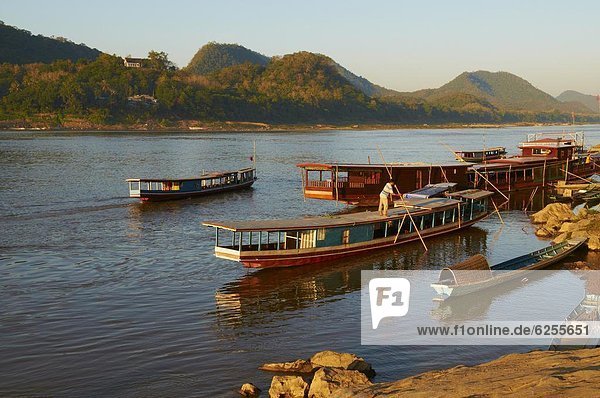 Tourist boats at sunset on the Mekong River  Luang Prabang  Laos  Indochina  Southeast Asia  Asia