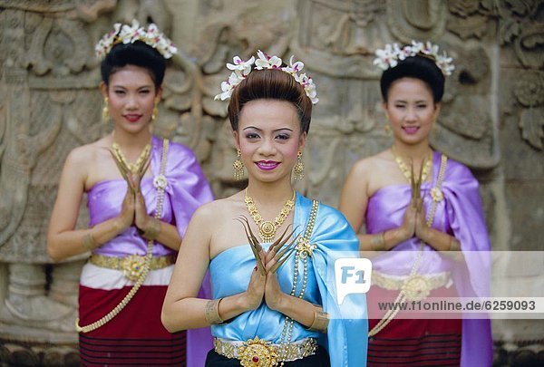 Portrait of three traditional Thai dancers  Chiang Mai  northern Thailand  Asia