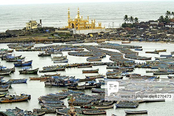 Fishing boats in harbour  coastal area of Vizhinjam  Trivandrum  Kerala  India