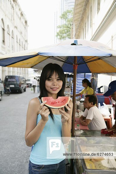 Bangkok  Hauptstadt  Wasser  Frau  Scheibe  Melone  Südostasien  Asien  thailändisch  Thailand
