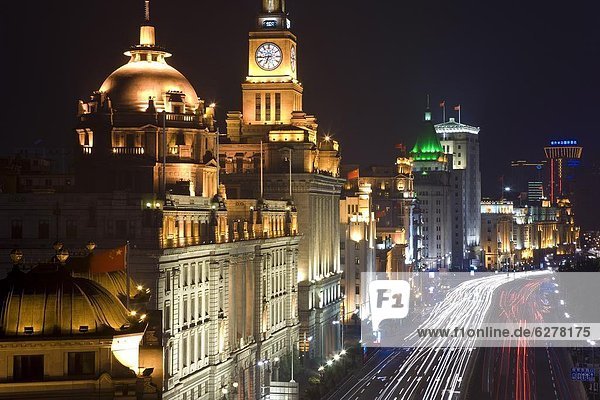 Historic buildings along Shanghai's famous Bund promenade  illuminated at night  Shanghai  China  Asia