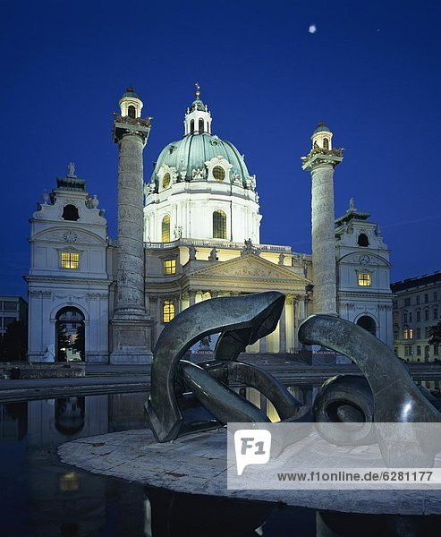 Karlskirche at night with Henry Moore sculpture in foreground  Vienna  Austria  Europe
