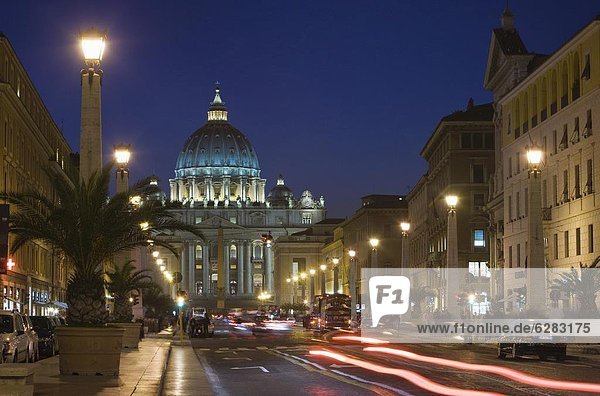 St. Peter's Basilica illuminated at night with moving traffic  Vatican City  Rome  Lazio  Italy  Europe
