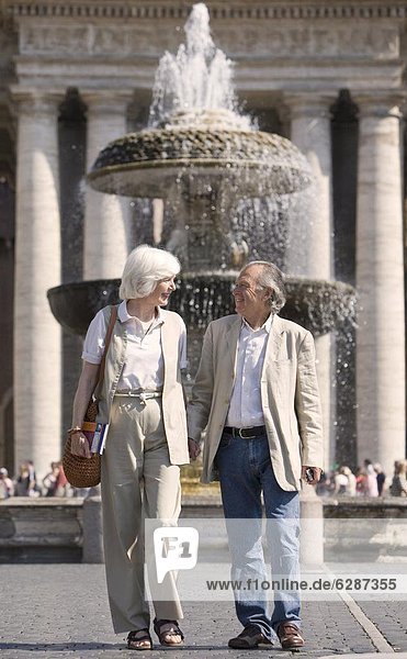 Senior tourists sightseeing in St. Peters Square  Rome  Lazio  Italy  Europe