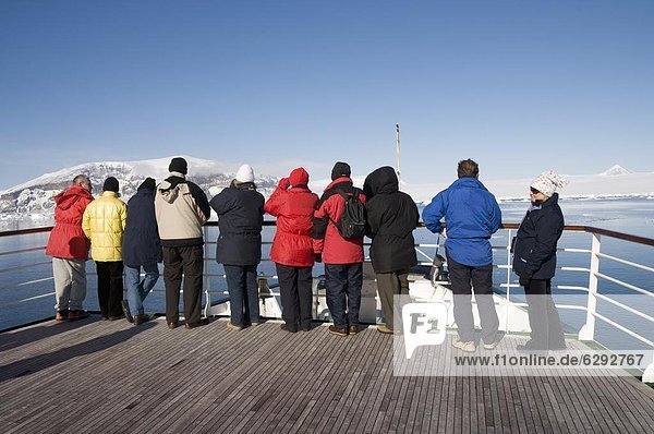 Tourists looking at ice in the Antarctic Sound  Antarctic Peninsula  Antarctica  Polar Regions