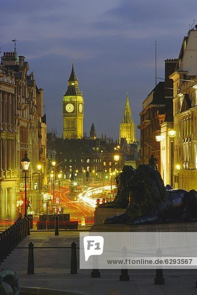 Evening view from Trafalgar Square down Whitehall with Big Ben in the background London England UK