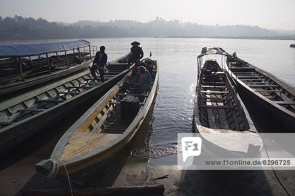Boats at border crossing to Huay Xai in Laos  Chiang Kong  Thailand  Southeast Asia  Asia