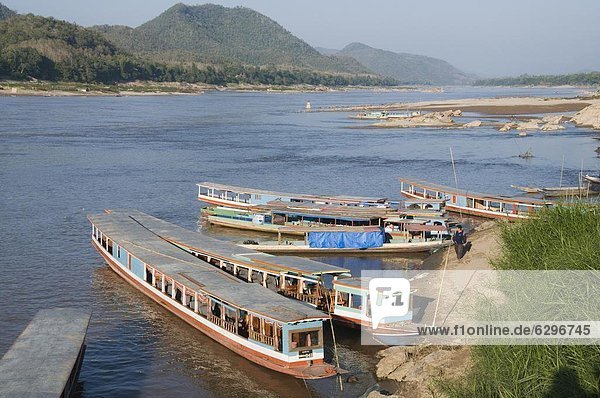 Tourist boats at the Pak Ou caves  Mekong River near Luang Prabang  Laos  Indochina  Southeast Asia  Asia