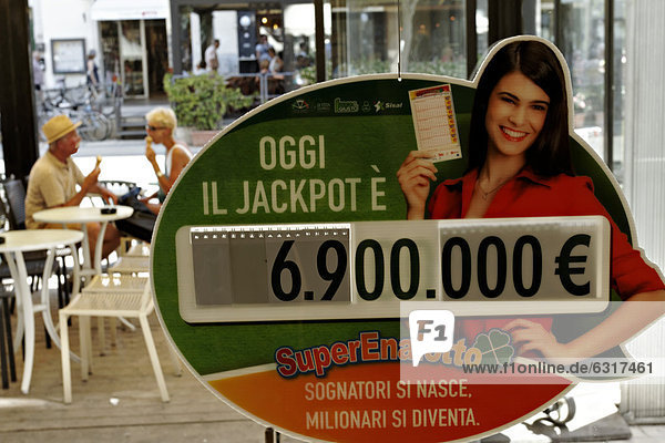 Italian lotto jackpot advertisement on shop window  Tuscany  Italy  Europe