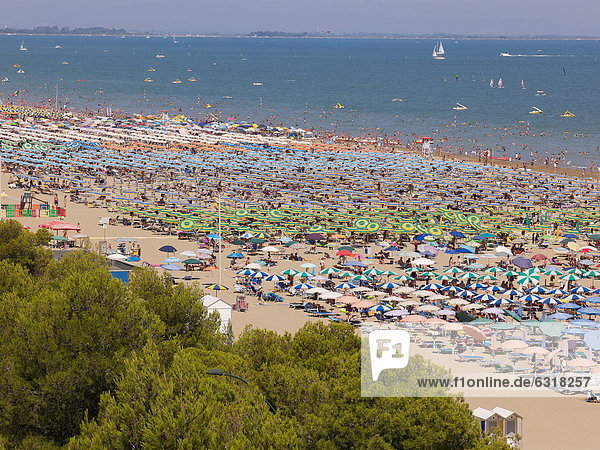 View of the beach with parasols and sun loungers  Lignano Sabbiadoro  Udine  Adriatic Coast  Italy  Europe