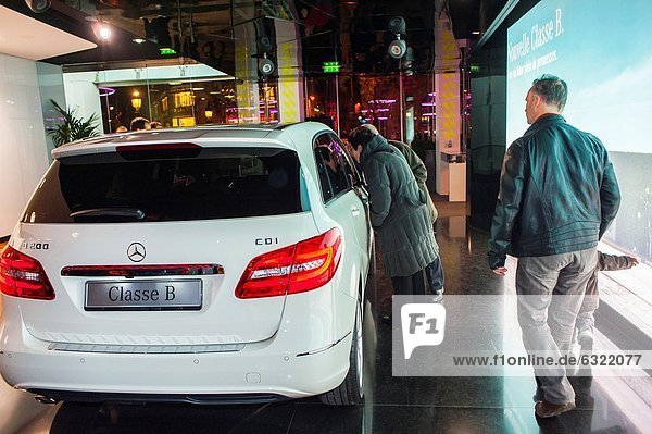 Paris  France  Couple Shopping in Luxury New Car Showroom  Mercedes Benz  CD1. Paris  France  Couple Shopping in Luxury New Car Showroom  Mercedes Benz  CD1